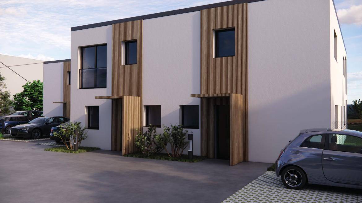 Moderne Reihenhäuser mit weißer Fassade, Holzverkleidung und Parkplätzen vor dem Eingangsbereich.