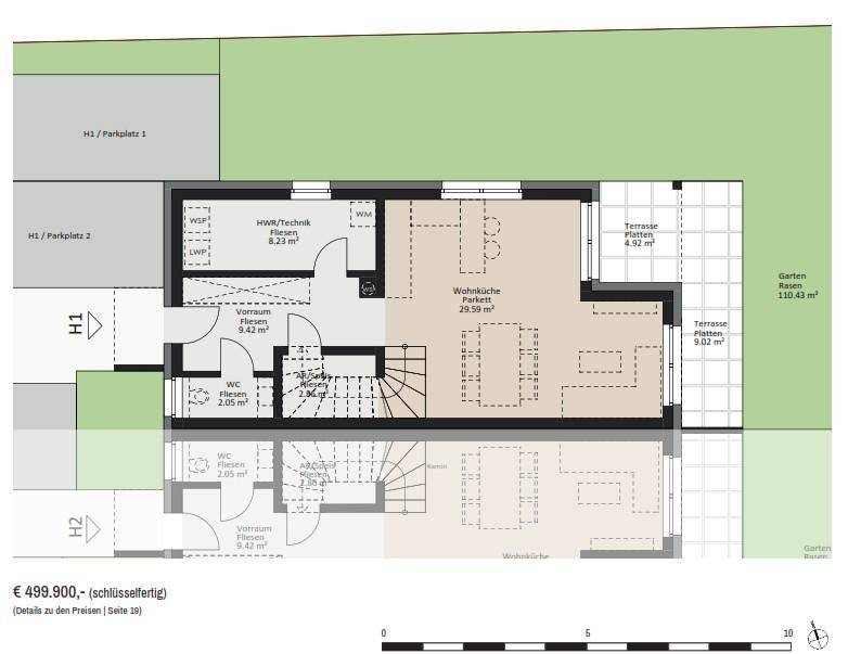 Grundriss des Erdgeschosses mit Wohnküche, Gäste-WC und zwei Terrassen.