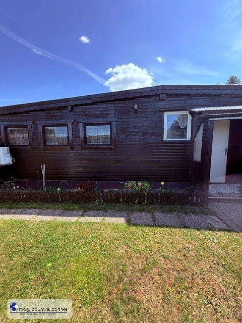 Modernes Campinghaus mit Gartenhütte , Hochbeet und Terrasse - Ansicht 2