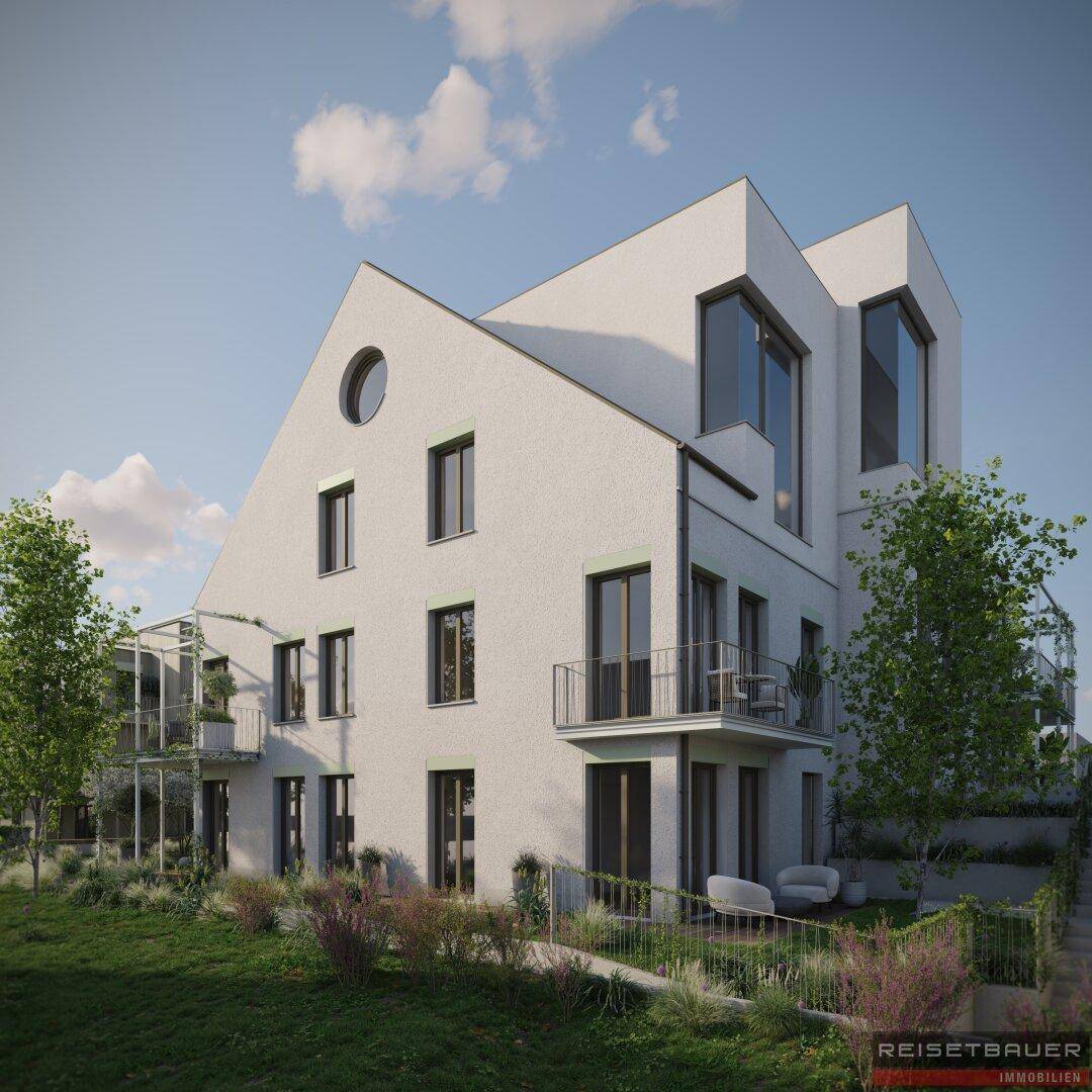 Neubau mit moderner Architektur, großen Fenstern und gepflegter Außenanlage, umgeben von Bäumen.