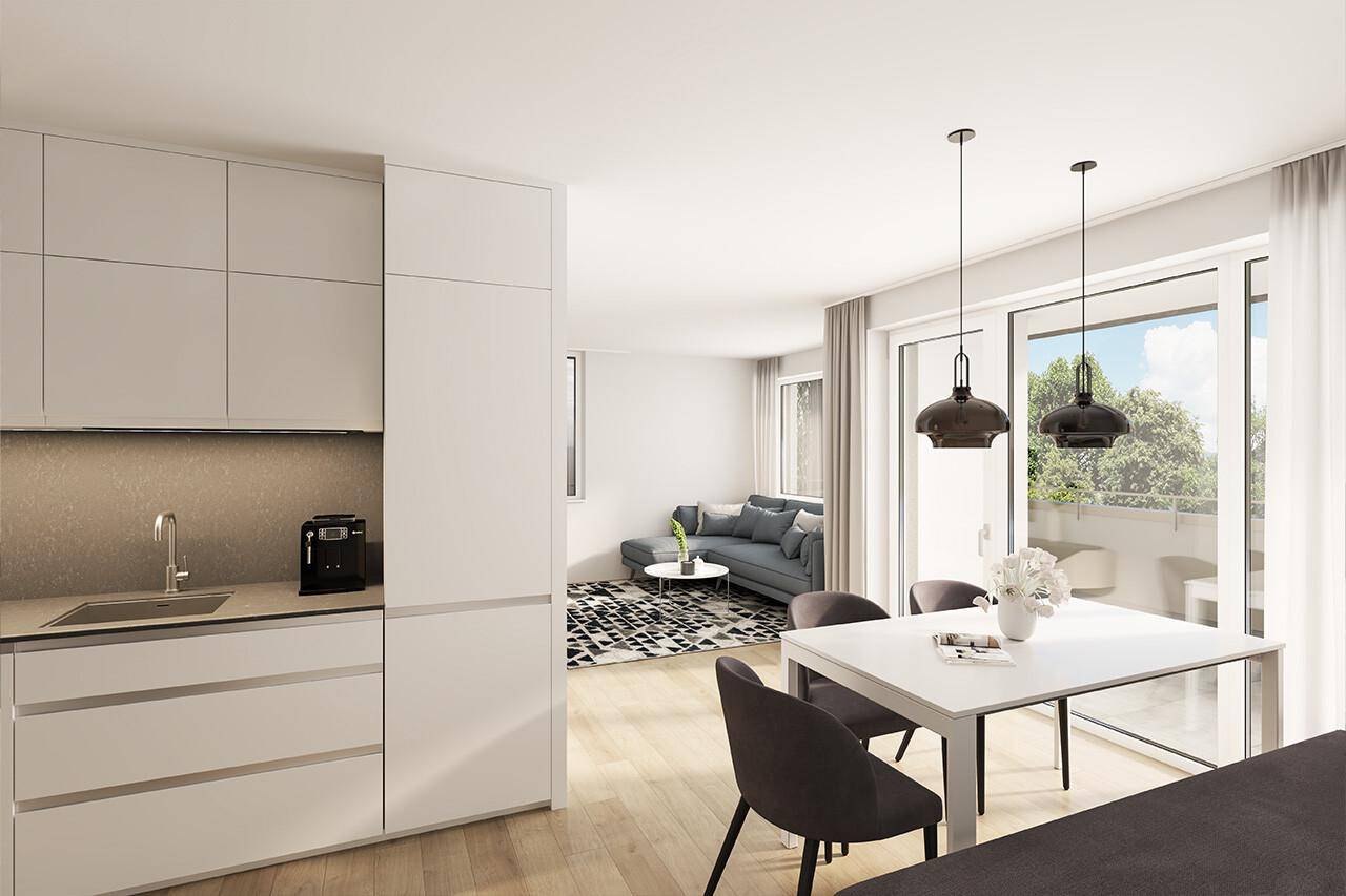 Moderne Küchenzeile im offenen Wohn-Essbereich mit Zugang zum Balkon und viel Tageslicht.
