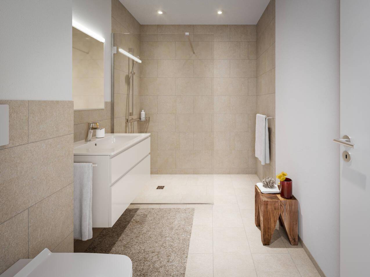 Modernes Badezimmer mit beigefarbenen Fliesen, einer geräumigen begehbaren Dusche und Waschtisch.