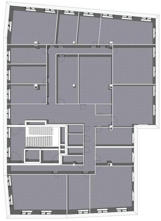 Grundriss eines Bürogebäudes mit mehreren Räumen und einem zentralen Treppenhaus.