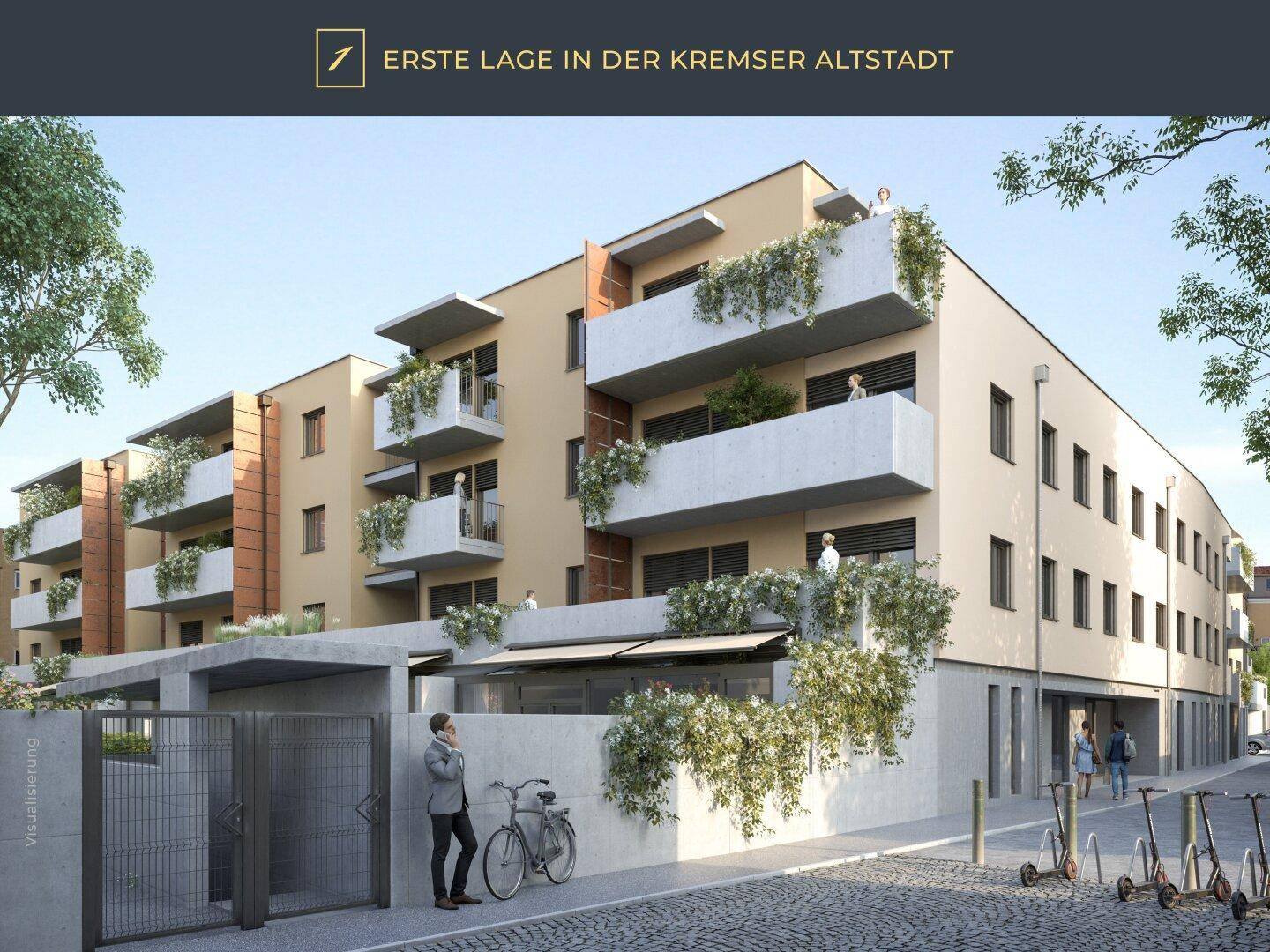 Moderne Wohnanlage mit begrünten Balkonen und einer Tiefgaragenzufahrt an der Straße.
