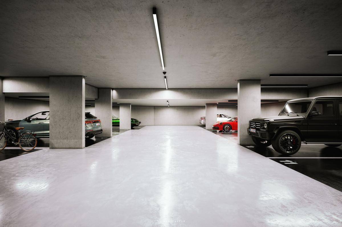 Geräumige Tiefgarage mit mehreren Stellplätzen und moderner Beleuchtung.