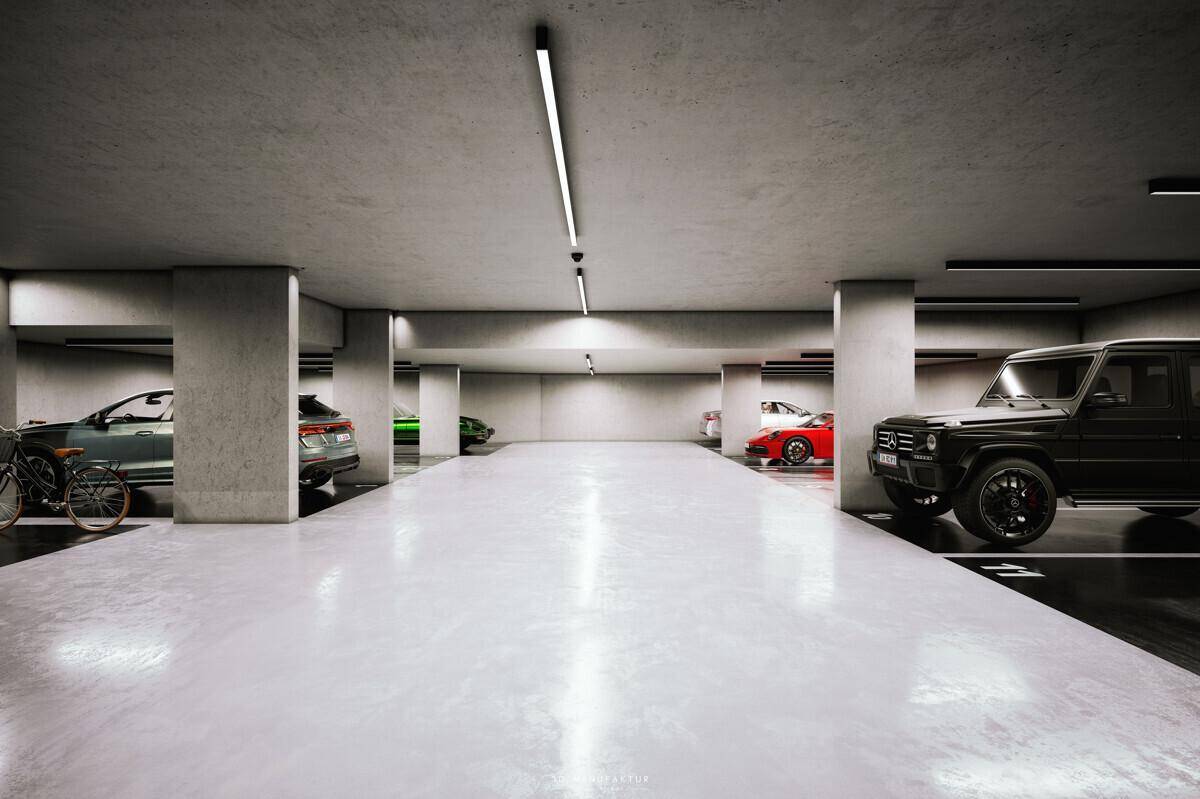 Geräumige Tiefgarage mit mehreren Stellplätzen und moderner Beleuchtung.