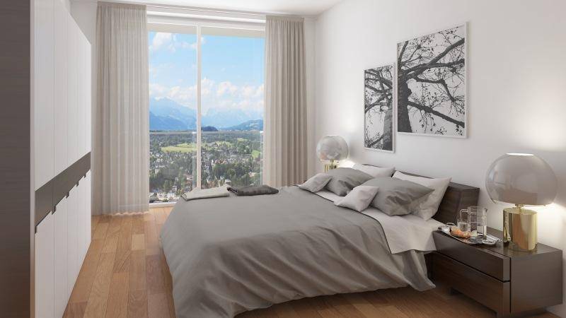 Modernes Schlafzimmer mit Holzboden, großem Fenster und beeindruckendem Bergblick.