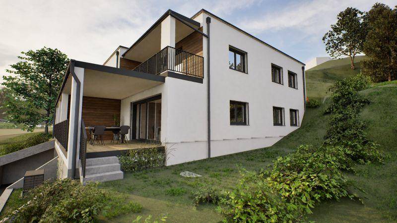 Seitliche Ansicht der Wohnanlage mit einer möblierten Terrasse und Zugang zum Garten.