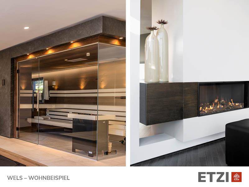Wellnessbereich mit moderner Sauna und stilvollem Kamin als Designelement.
