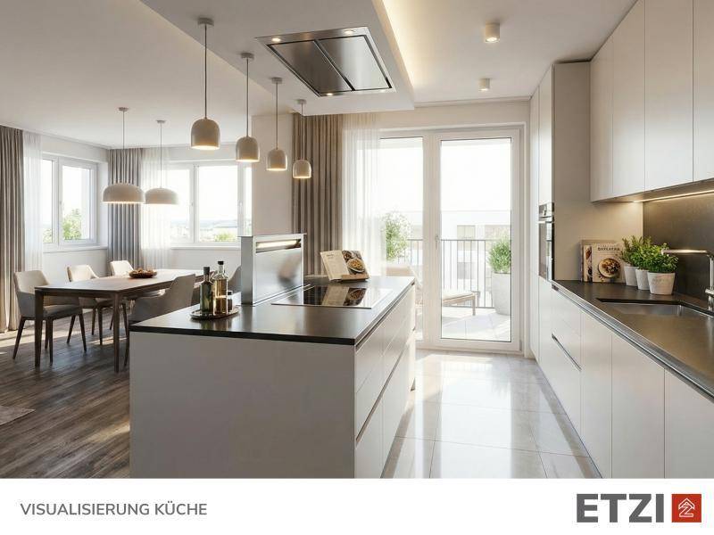 Helle, offene Küche mit Essbereich, Kücheninsel und Zugang zum Balkon.