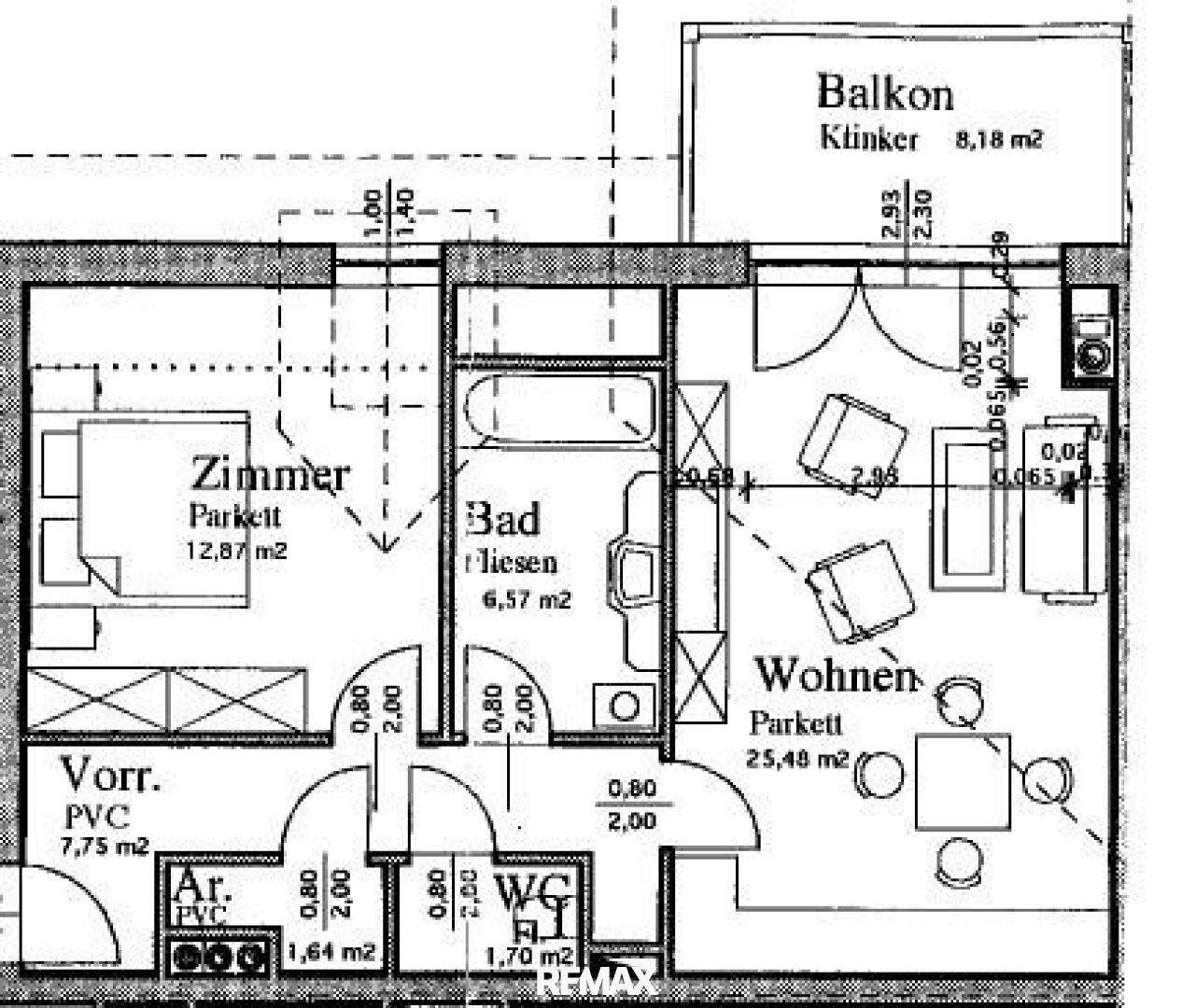 Grundriss einer Wohnung mit Wohnzimmer, Schlafzimmer, Bad, WC und Balkon.