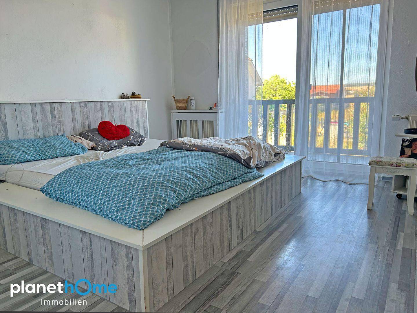 Schlafzimmer mit Balkon