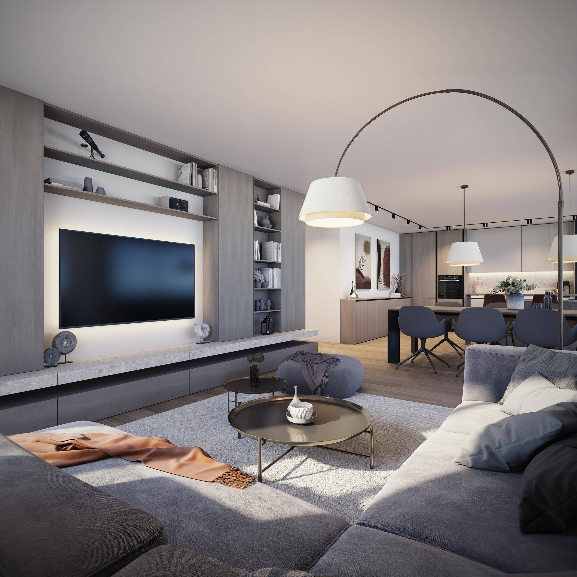 Moderner offener Wohnbereich mit integriertem TV-Möbel und Blick auf den Essbereich.