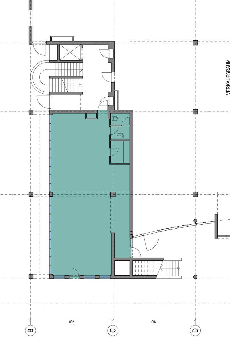 Grundrissplan eines Verkaufsraums mit Treppenhaus und Sanitäranlagen.
