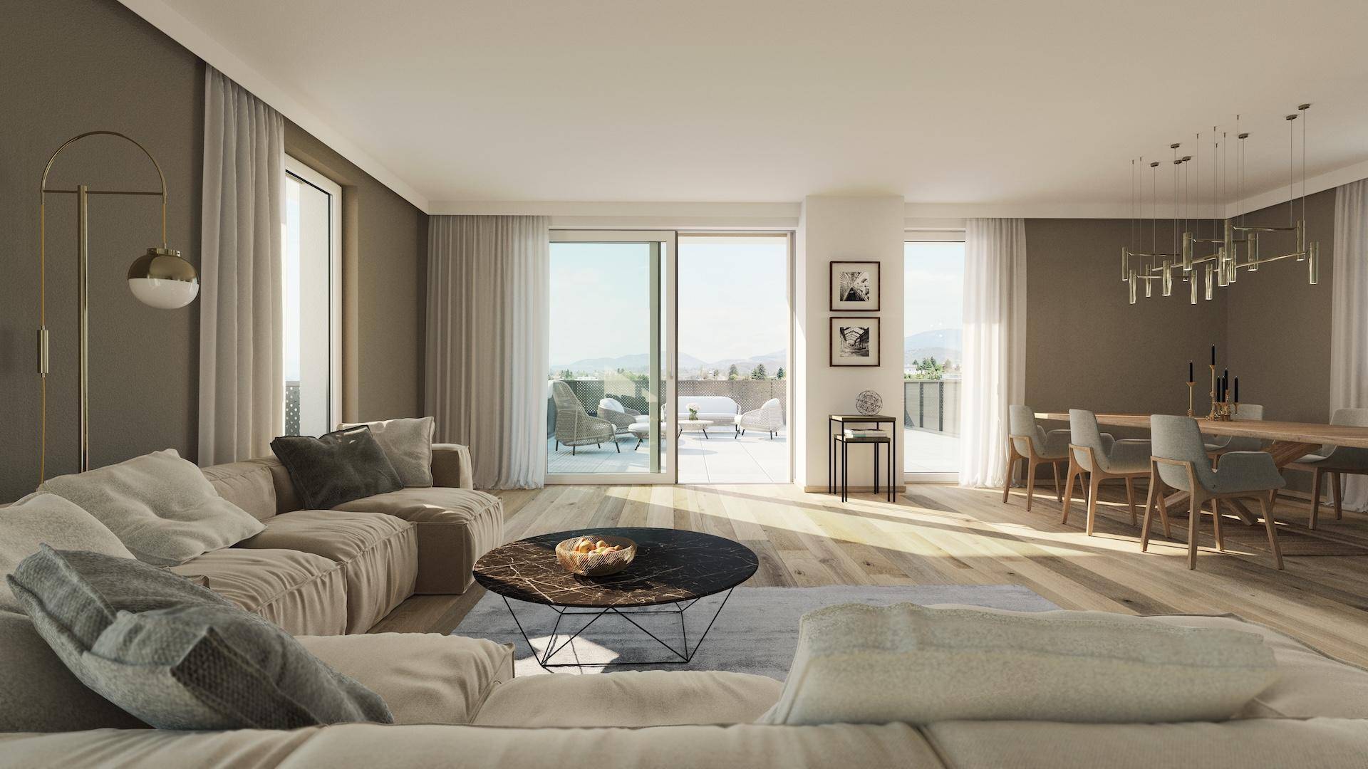 Helles, offenes Wohn-Esszimmer mit Holzboden und Zugang zu einer großen Terrasse.