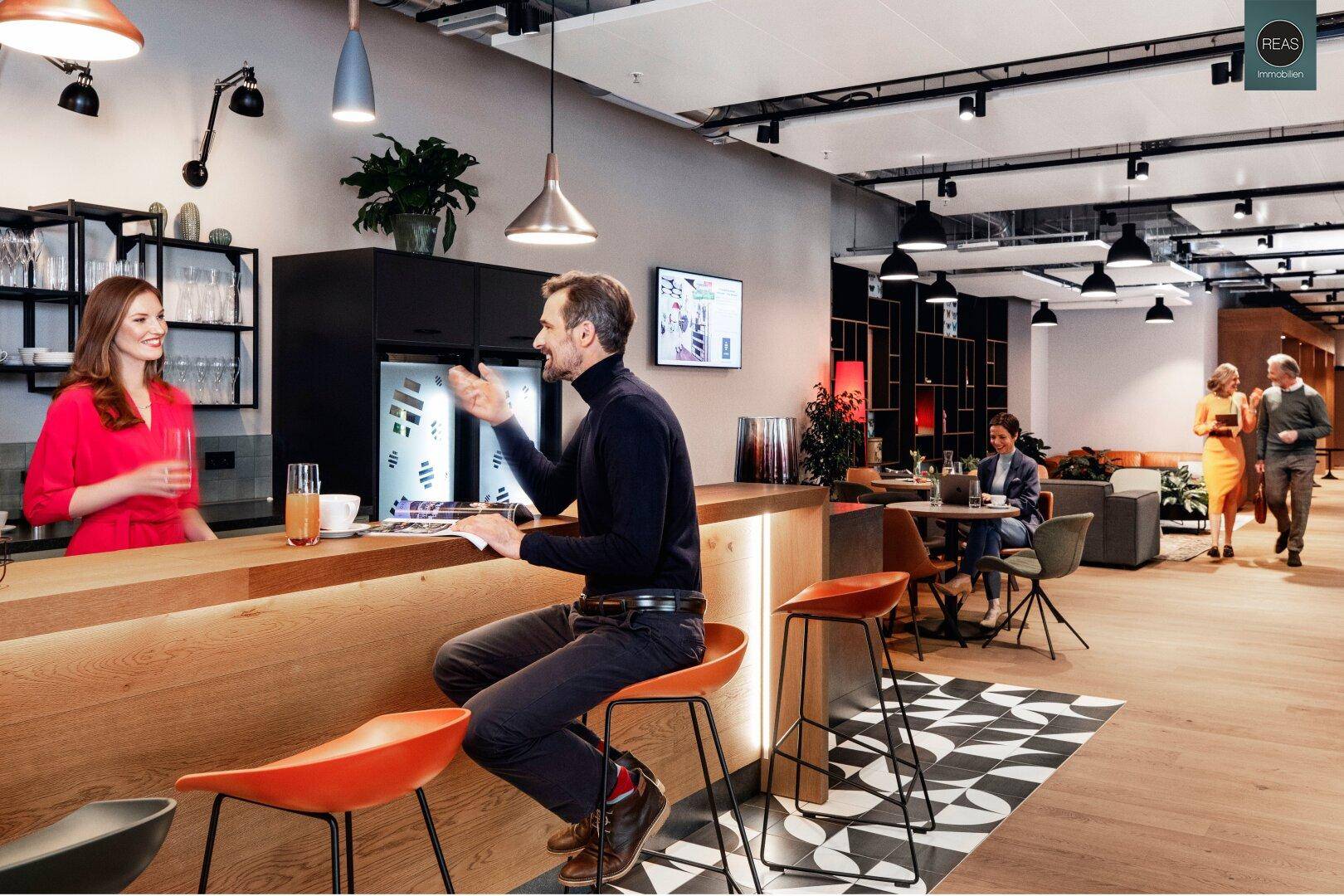 Stilvolle Bar im Bürogebäude mit Holztresen und Hockern, perfekt für informelle Treffen und Pausen.