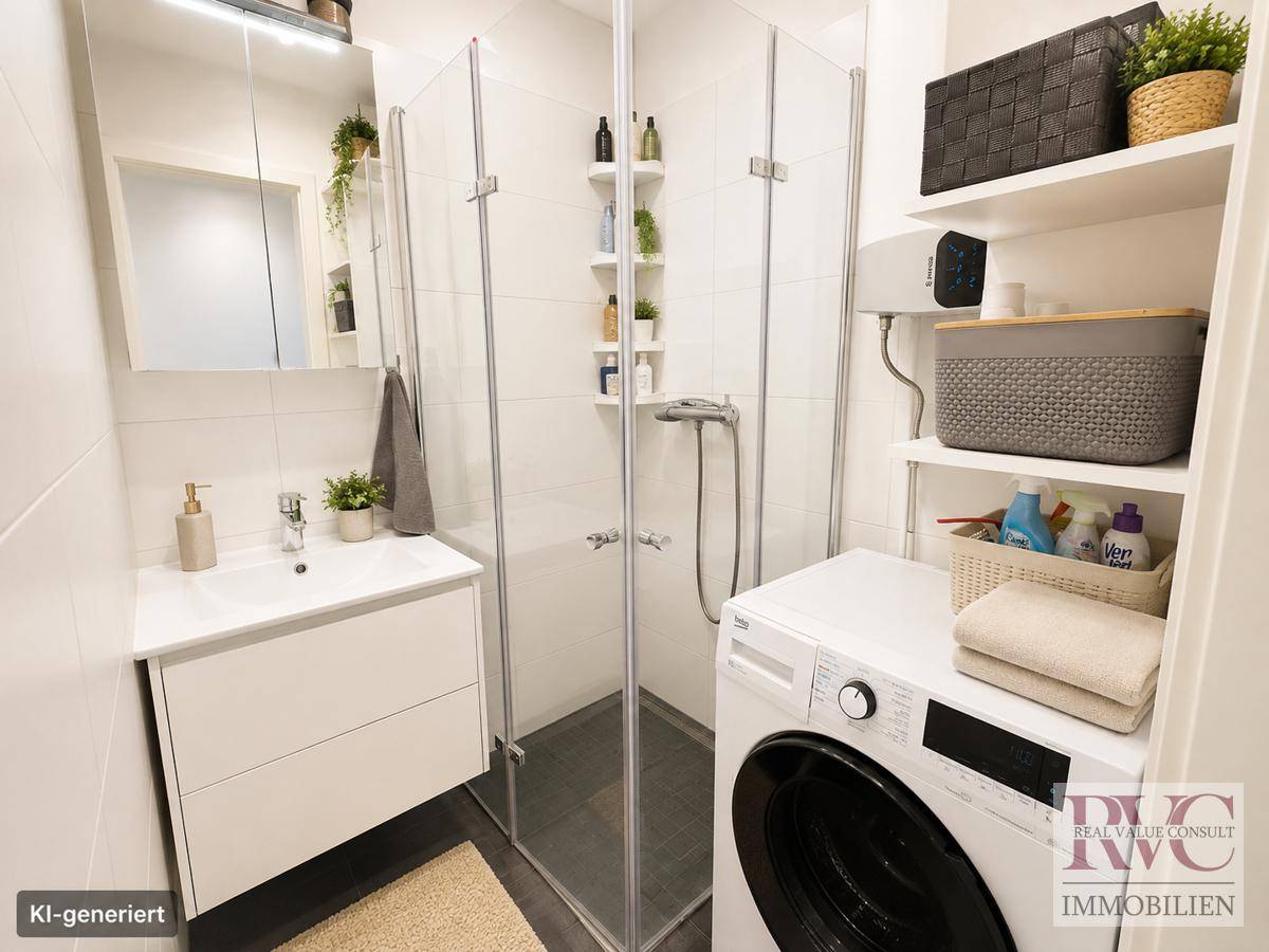 Modernes Badezimmer mit Duschkabine, Waschbecken und integrierter Waschmaschine.