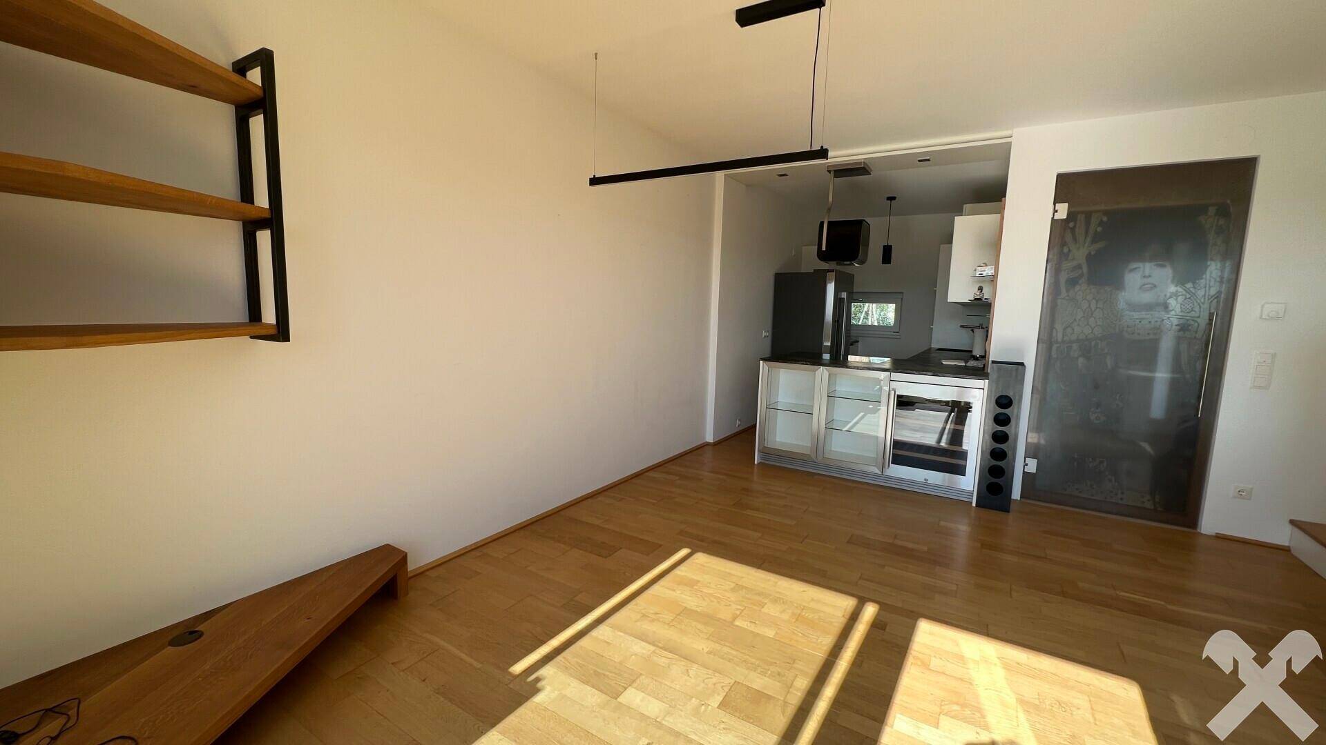 Wohnzimmer mit integrierter Küche