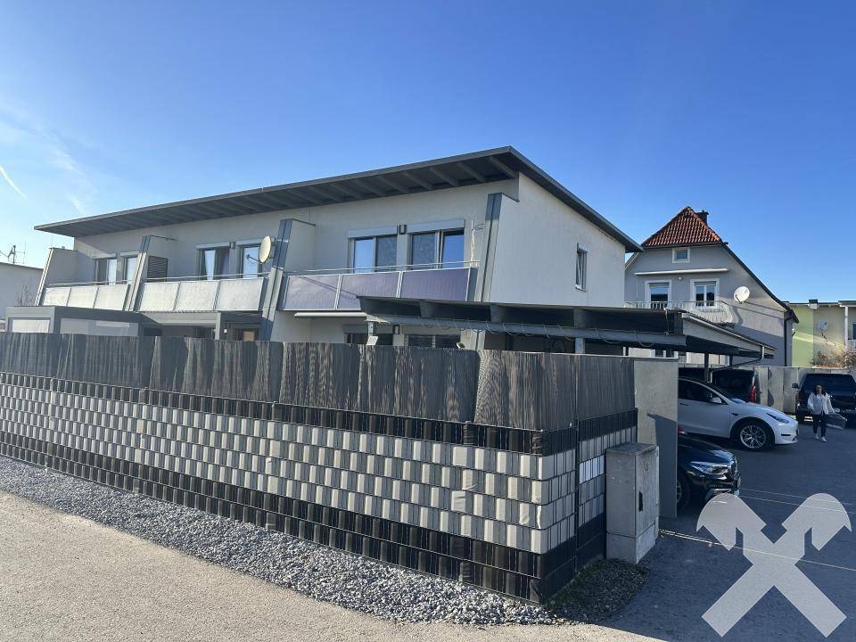 Wohnhausanlage mit Carport