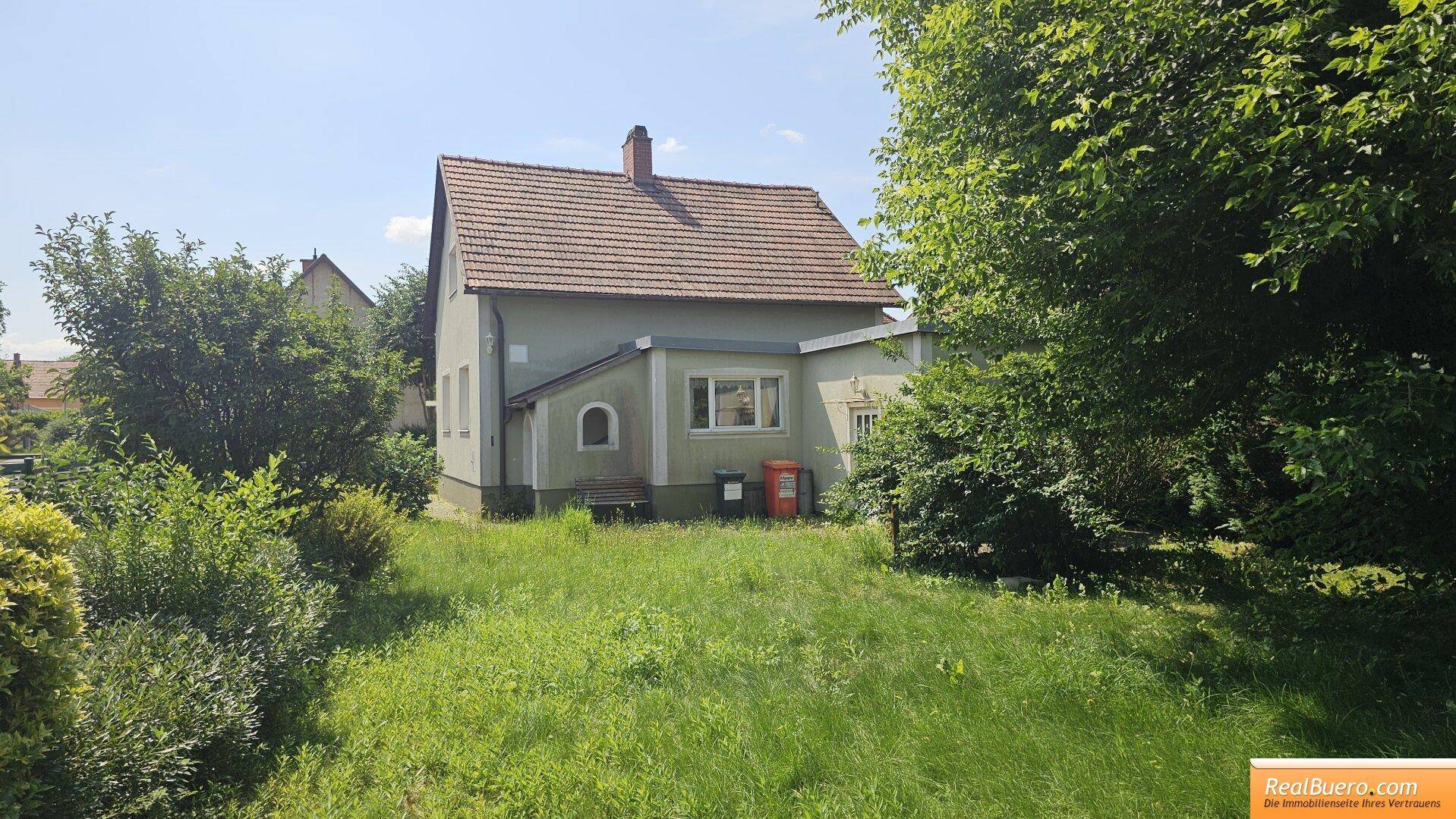 EINFAMILIENHAUS MIT KFZ STELLPLATZ UND GARTEN - Ansicht 3
