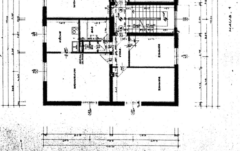Grundrissplan mit Aufteilung in Küche, Bad, Wohnraum und Zimmer.