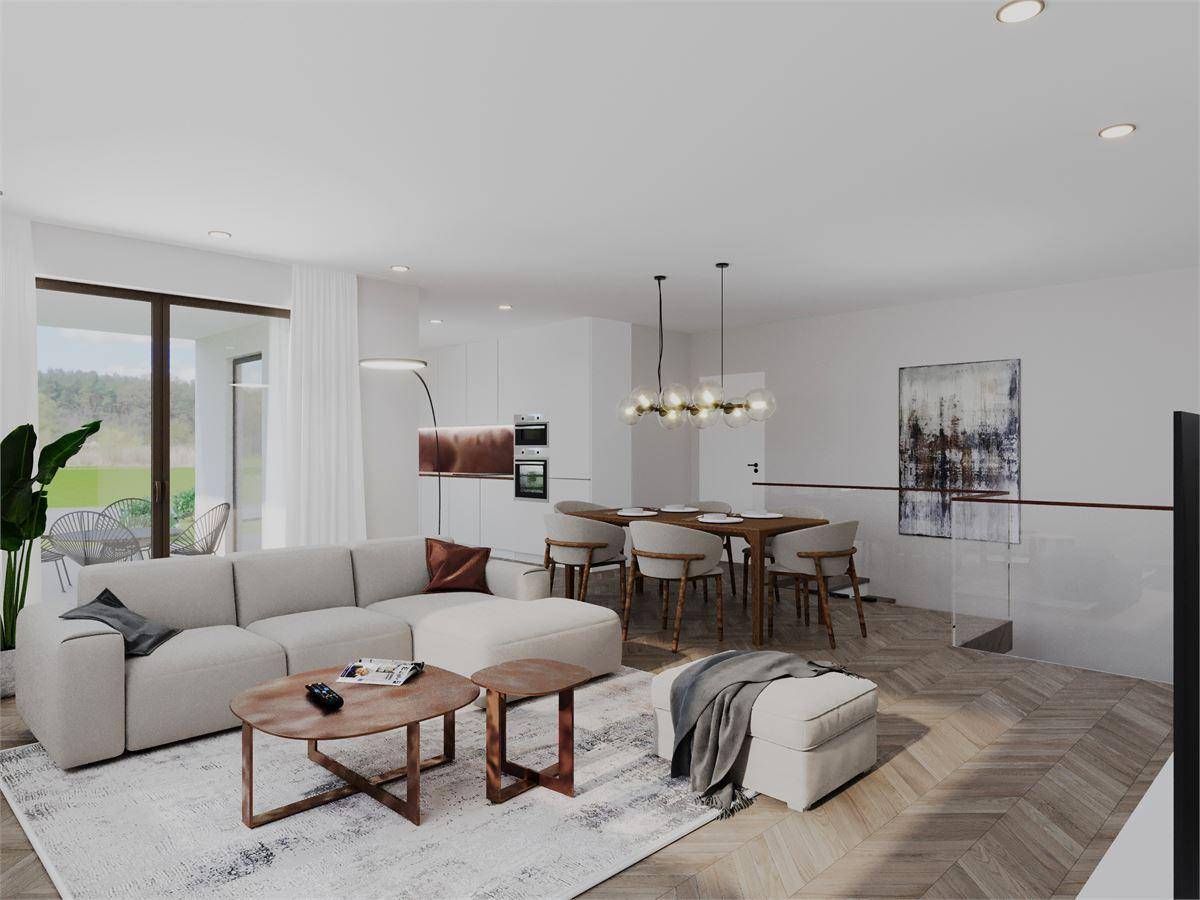 Modernes, offenes Wohn- und Esszimmer mit integrierter Küche und Zugang zur Terrasse.