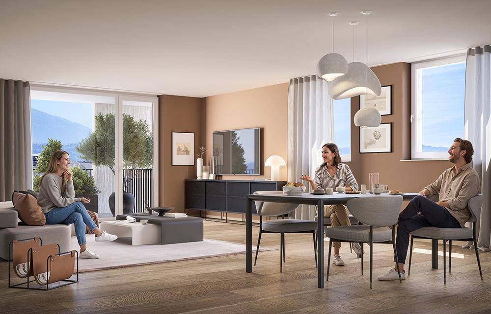 Heller offener Wohn-Essbereich mit modernem Design, Holzboden und Zugang zum Balkon.