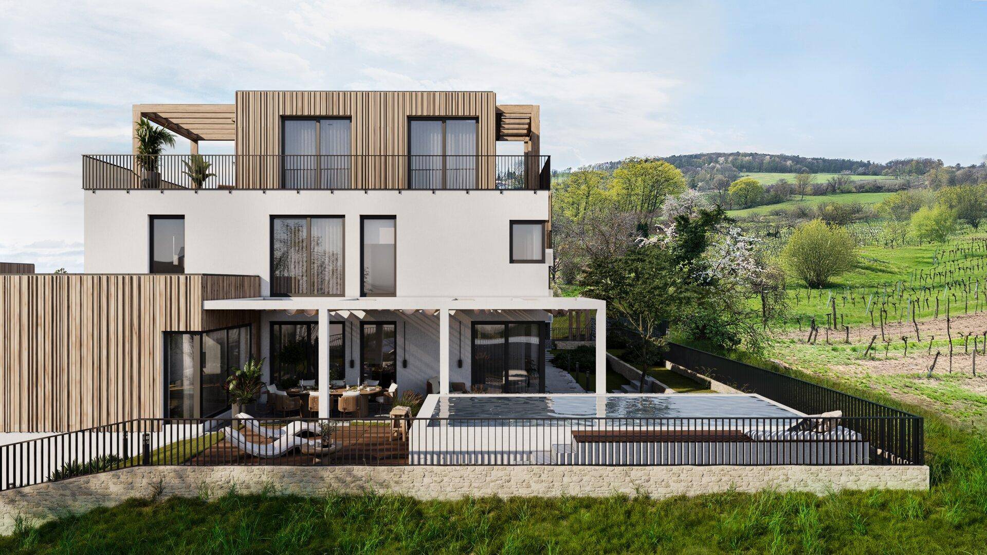 Modernes Gebäude mit Poolbereich und atemberaubendem Blick auf die umliegenden Weinberge und grüne Hügel.