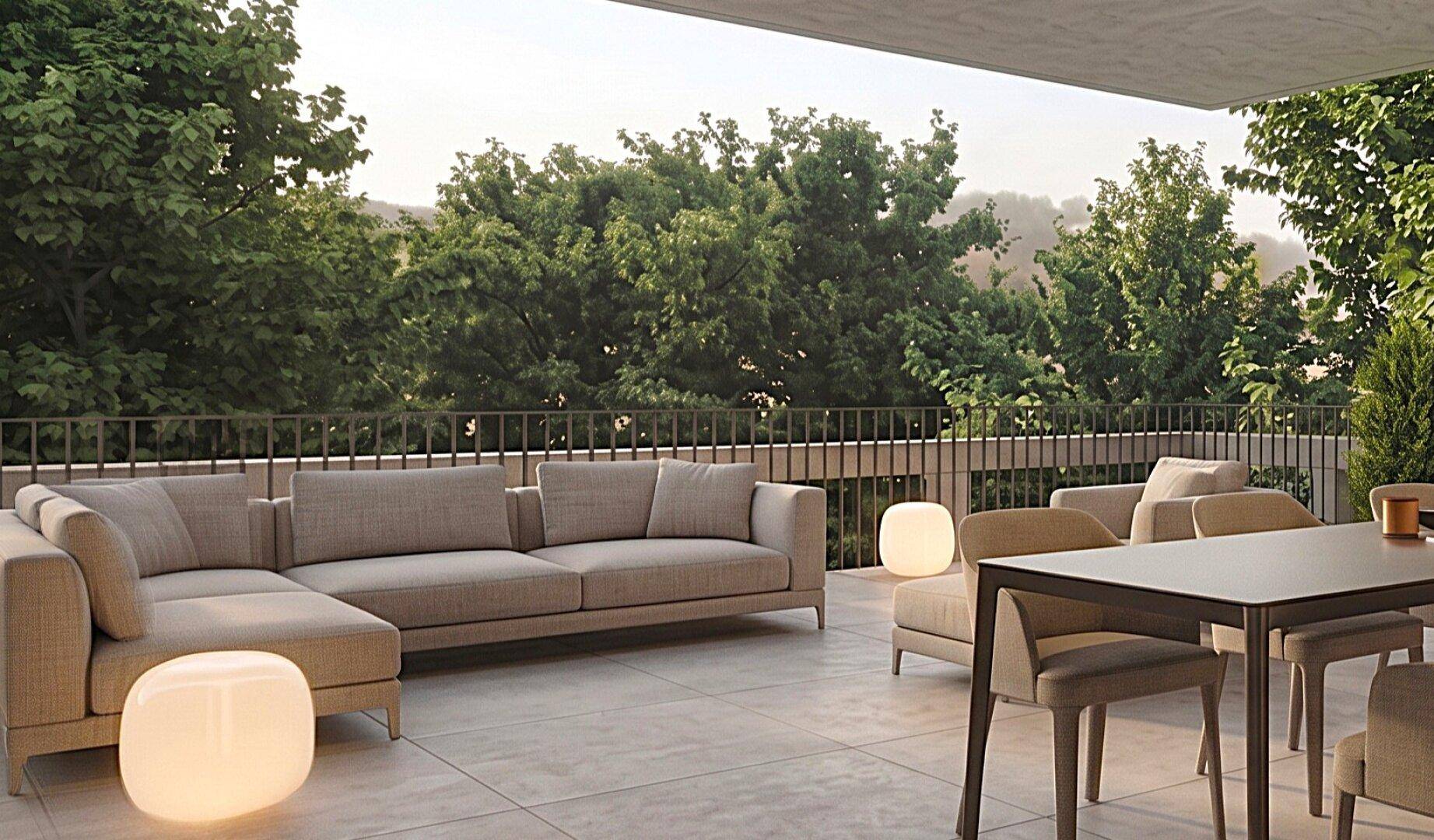 Geräumige Terrasse mit modernen Outdoor-Möbeln, Essbereich und weitem Blick ins Grüne.