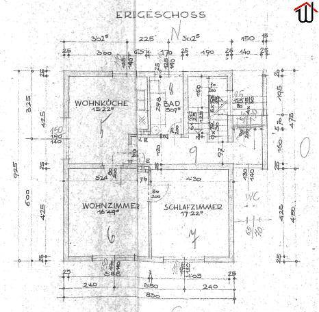 Grundriss des Erdgeschosses mit Wohnküche, Wohnzimmer, Schlafzimmer und Bad.