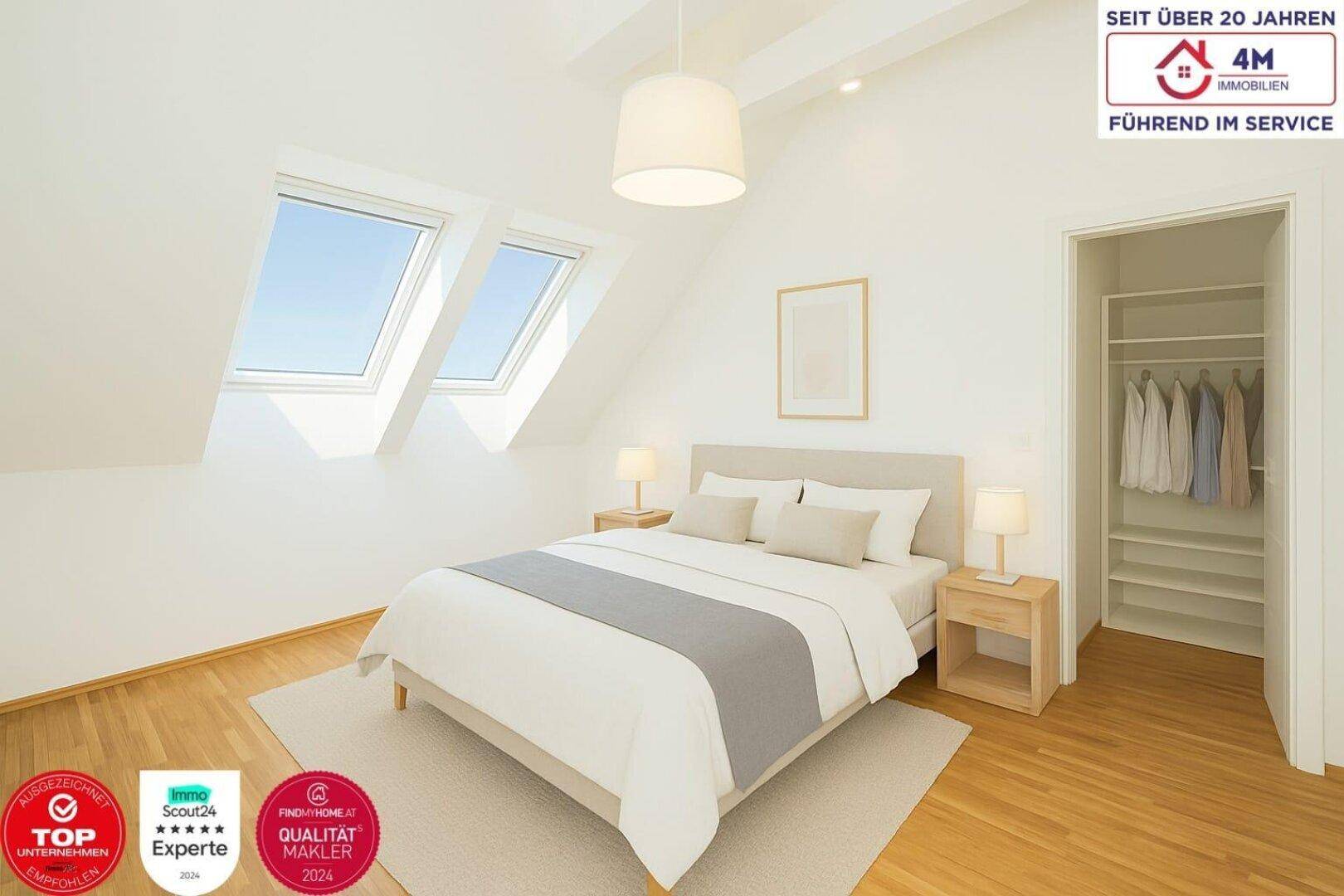 Helles Schlafzimmer im Dachgeschoss mit Holzboden, zwei Dachfenstern und Einbauschrank.
