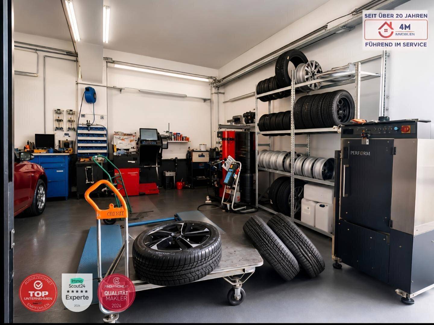 Gut ausgestattete Autowerkstatt mit Reifenregalen, Hebebühne und verschiedenen Maschinen für den Service.