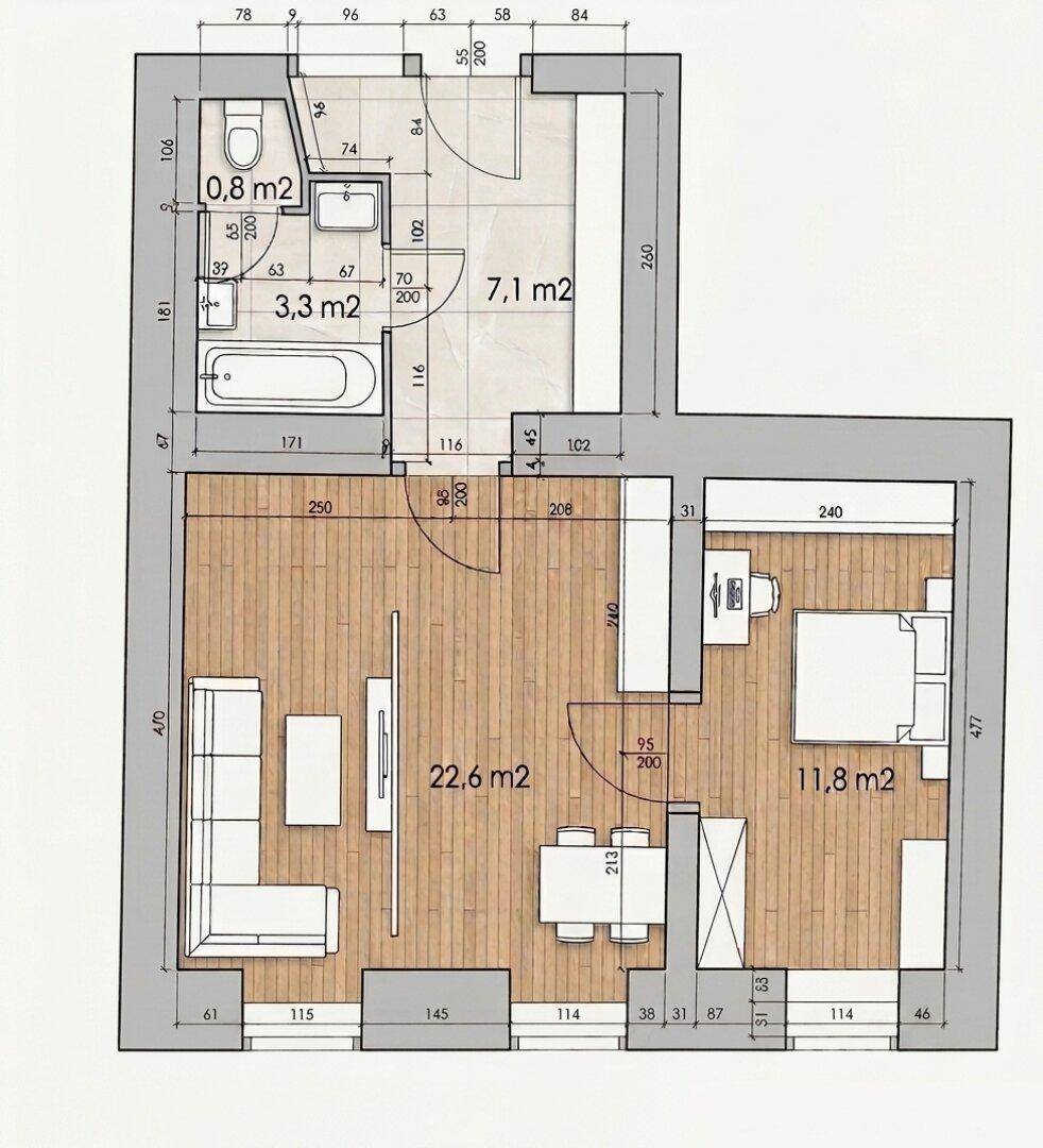 Grundriss einer Wohnung mit Wohn-Essbereich, Schlafzimmer, Bad und separatem WC.