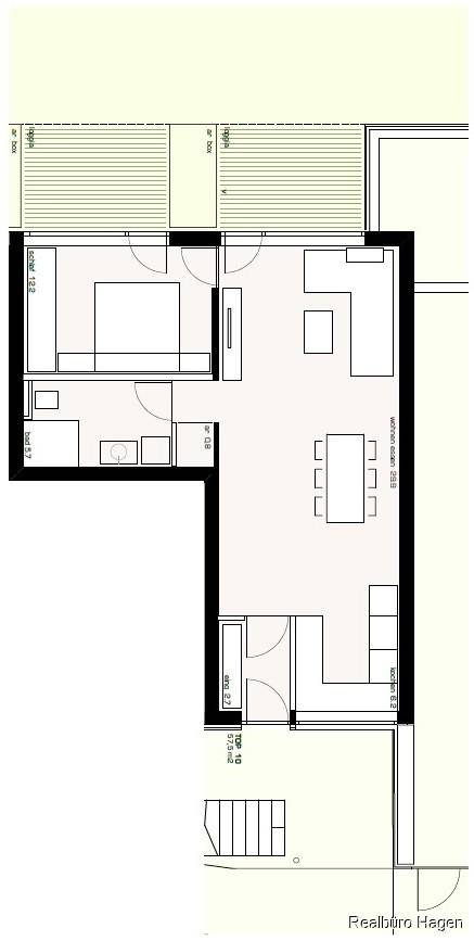 Grundriss der Wohnung mit offenem Wohnbereich, Schlafzimmer und Terrasse.