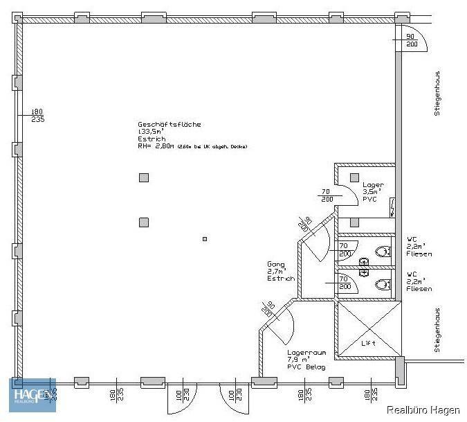 Grundriss einer Geschäftsfläche mit separaten Toiletten, Lagerbereichen und einem Aufzug.