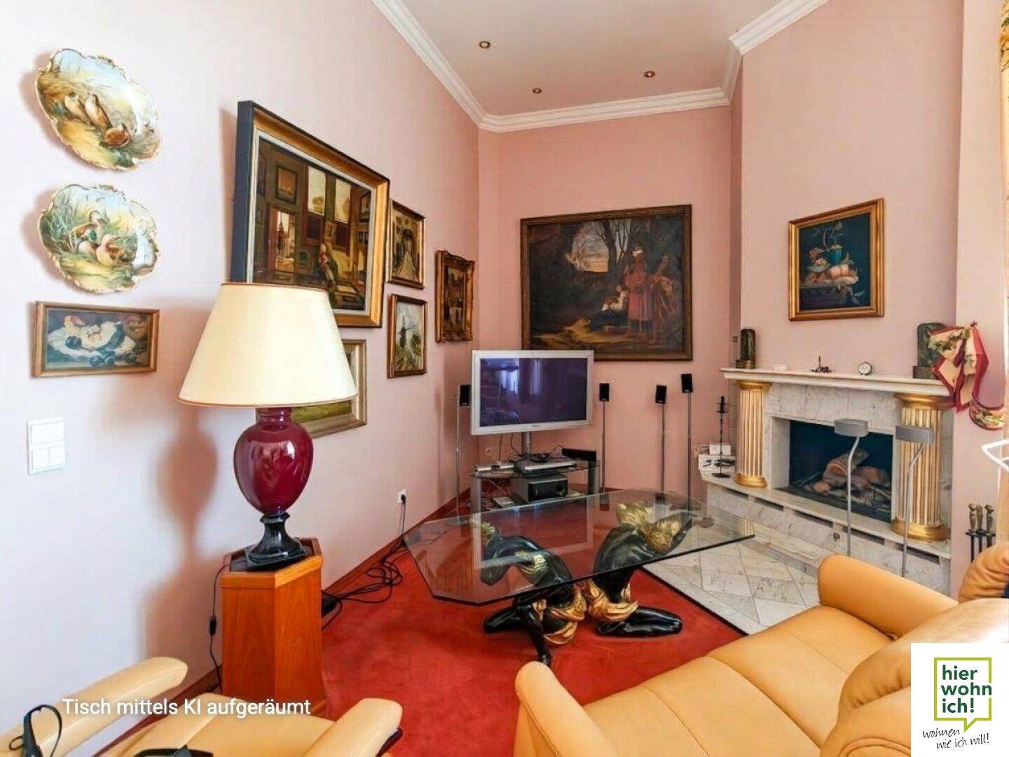 Geräumiges Wohnzimmer mit Kamin, rotem Teppich und klassischer Einrichtung.