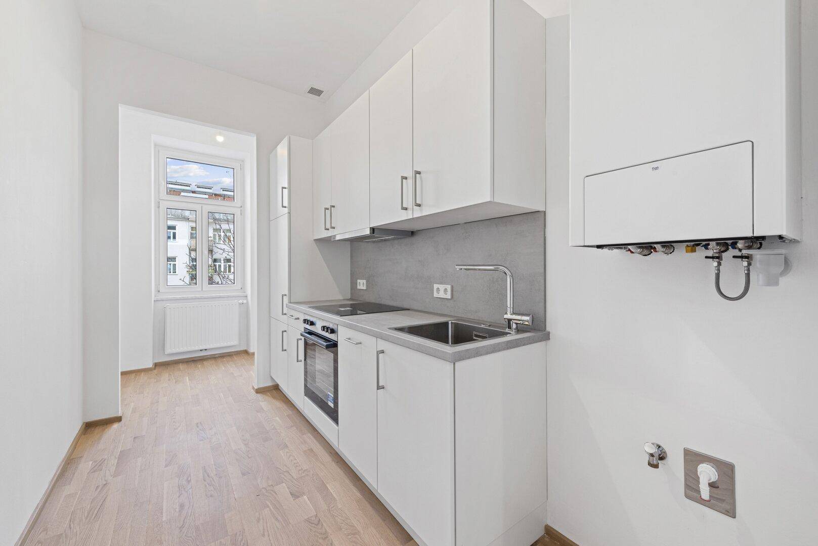 Moderne 1 Zimmer Eigentumswohnung mit Einbauküche - Ansicht 2