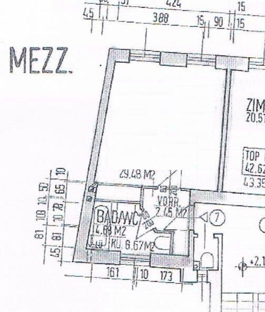 Ausschnitt eines Grundrisses mit Bad, WC und weiteren Räumen.