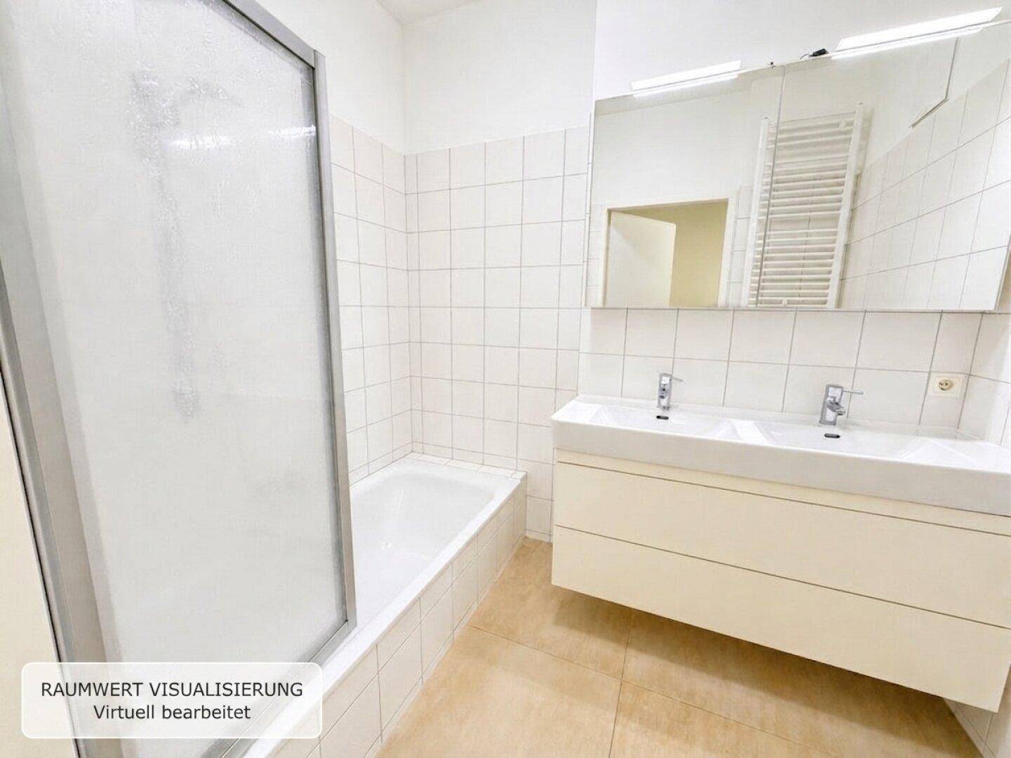 Modernes Badezimmer mit Badewanne, Duschabtrennung, Doppelwaschbecken und beheiztem Handtuchhalter.