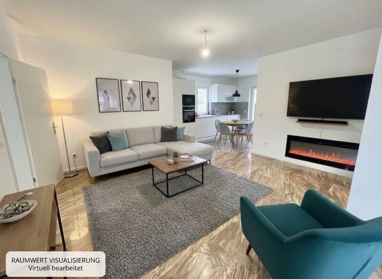 Heller offener Wohn- und Essbereich mit modernem Sofa, Kamin und integrierter Küche.