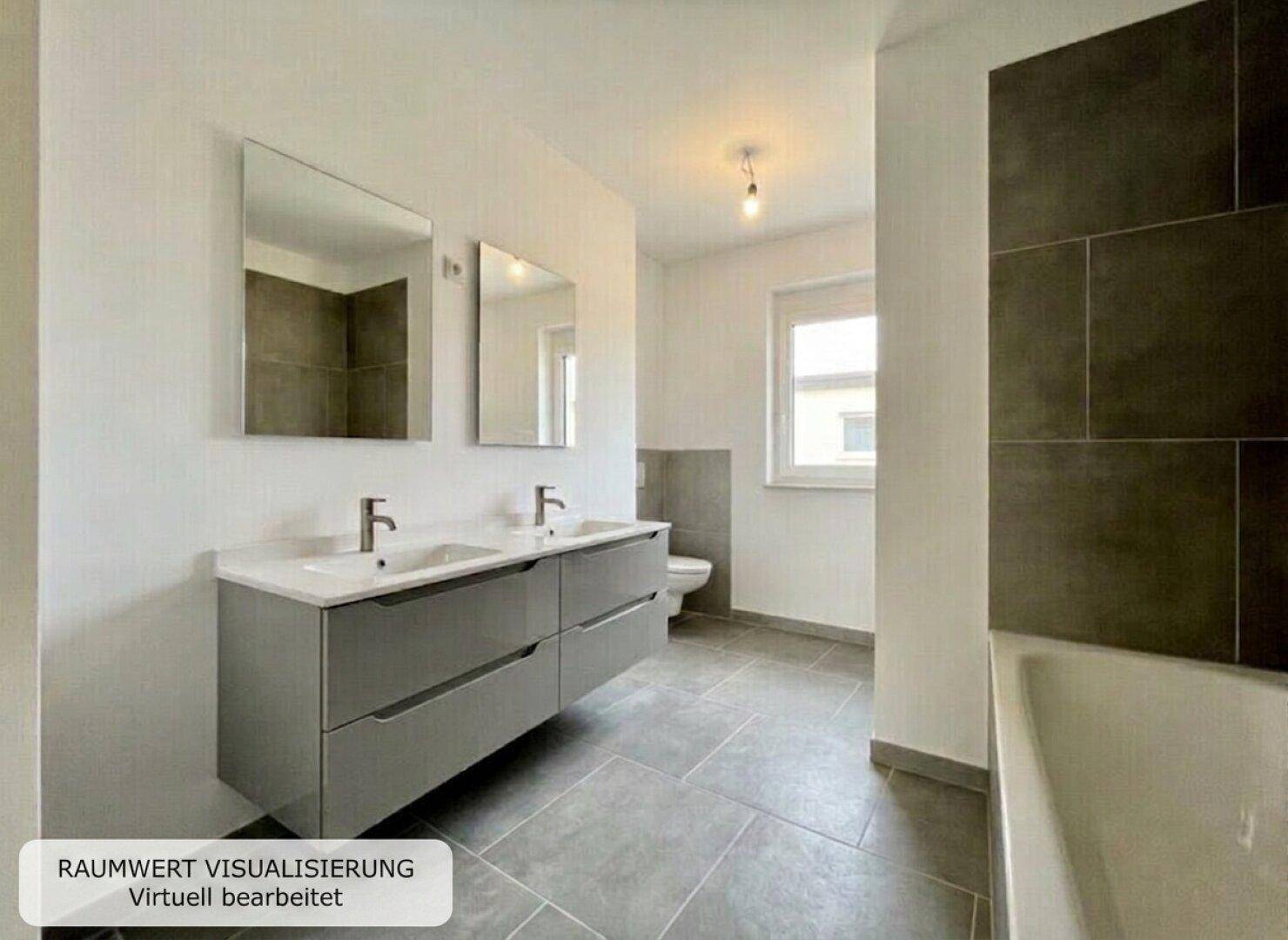 Modernes Badezimmer mit Doppelwaschbecken, Badewanne und großformatigen grauen Fliesen.