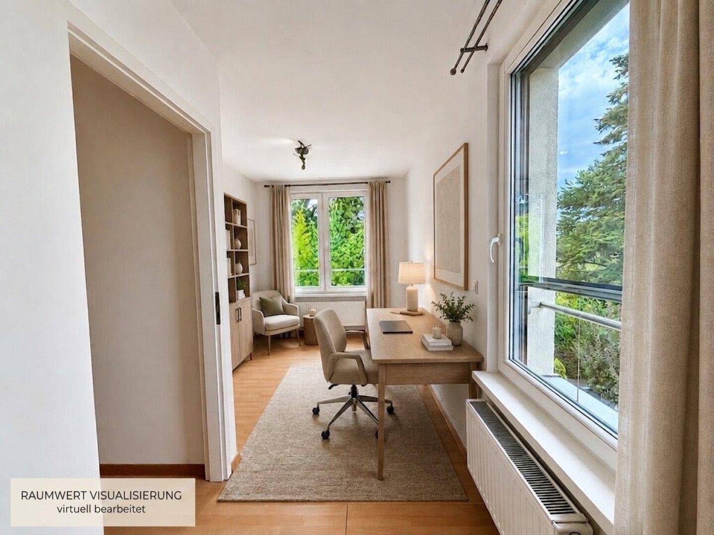 Modern eingerichtetes Arbeitszimmer mit großem Fenster und Blick auf die umliegende Natur.