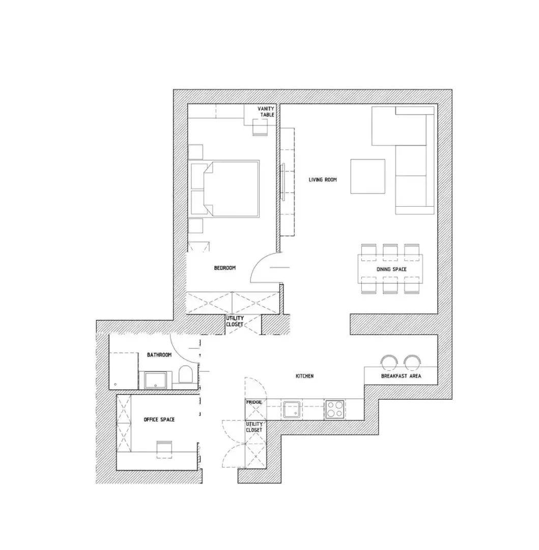 Grundriss der Wohnung mit Schlafzimmer, Wohnbereich, Küche und Bad.