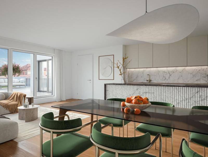 Moderner Wohn-Essbereich mit offener Küche, Marmor-Arbeitsplatte und Zugang zur Terrasse.