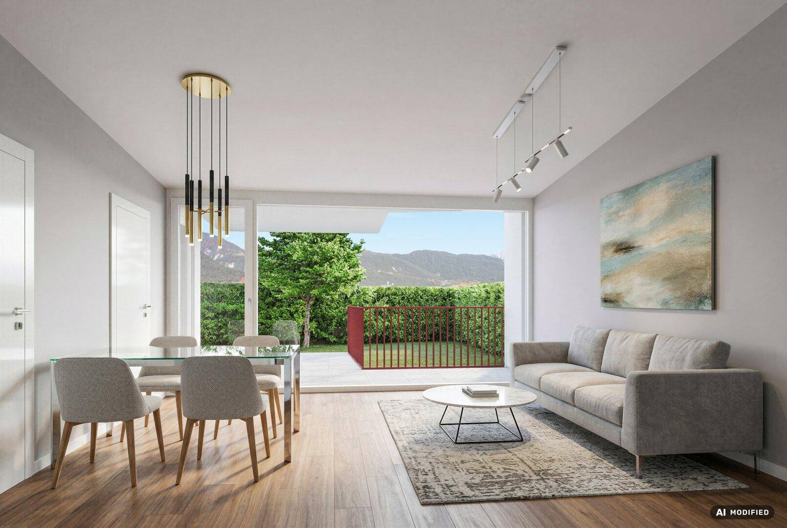 Gemütlicher Wohn-Essbereich mit Holzboden und direktem Zugang zu einem kleinen Balkon mit Grünblick.