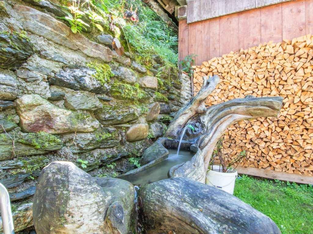 Brunnen Schnitzkunst