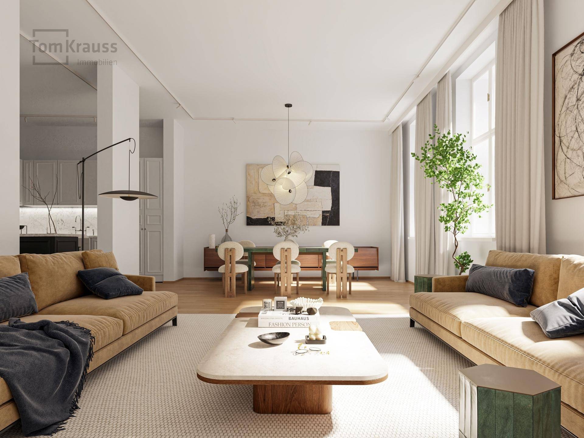 Großzügiger Wohn- und Essbereich mit zwei Sofas, Holzboden und hohen Decken.
