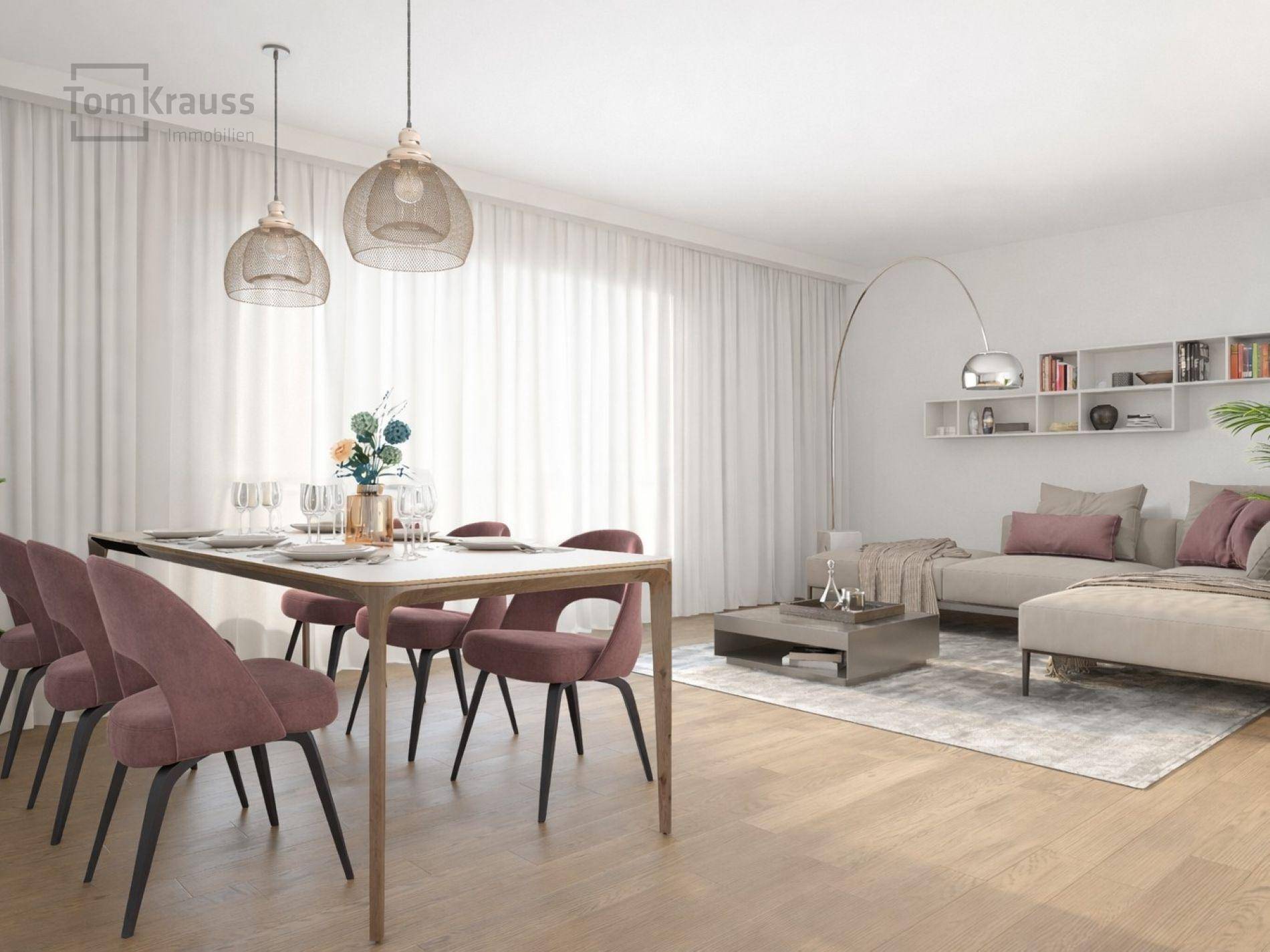 Eleganter Wohn- und Essbereich mit Holzboden, modernen Möbeln und viel Tageslicht.