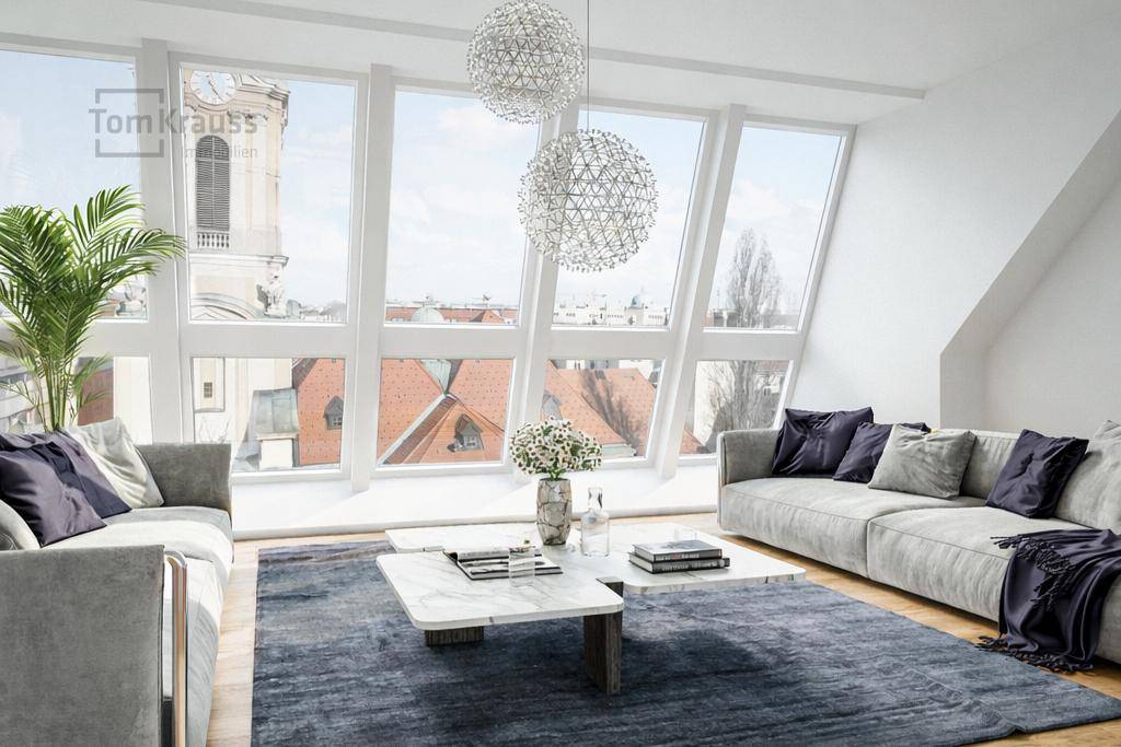 Elegantes Wohnzimmer mit großen, schrägen Fenstern und weitem Blick auf die Stadt und eine Kirche.