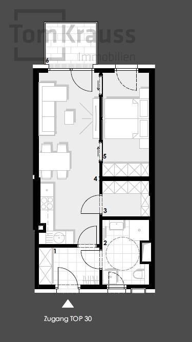 Grundriss einer Wohnung mit offenem Wohnbereich, Schlafzimmer und Badezimmer.